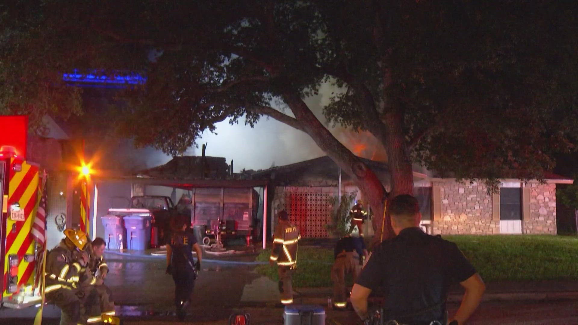 Firefighters say the fire began in their garage, then spread into their home.