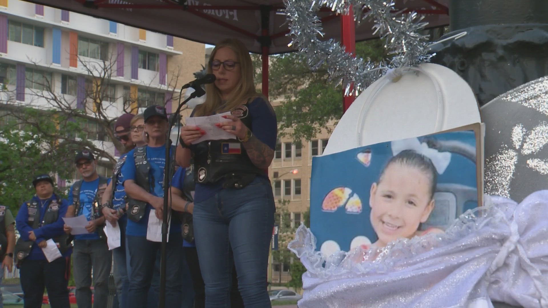 The vigil also honors the victims by reading each name and lighting a candle in their memory.