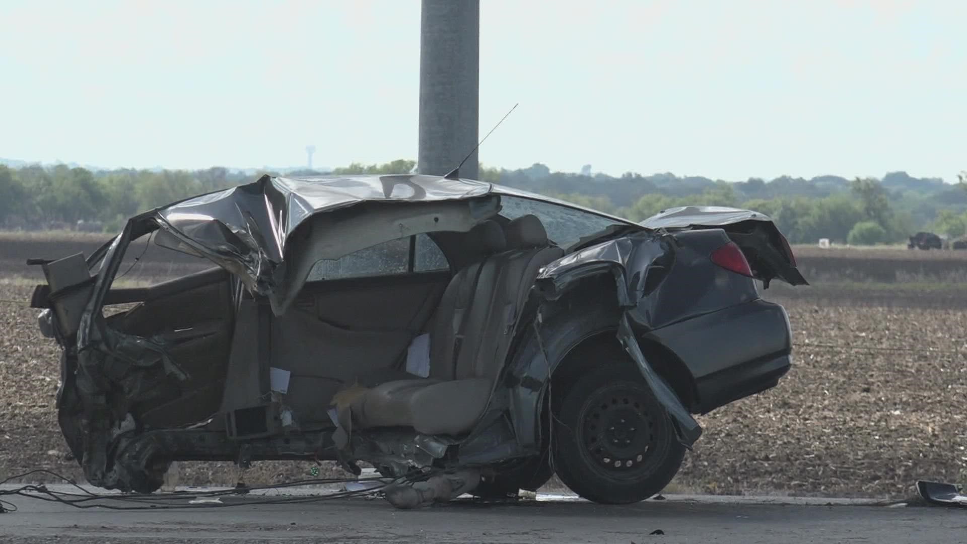 Roads in the area were closed for at least two hours as the Bexar County Sheriff's Office investigated the two-vehicle crash.