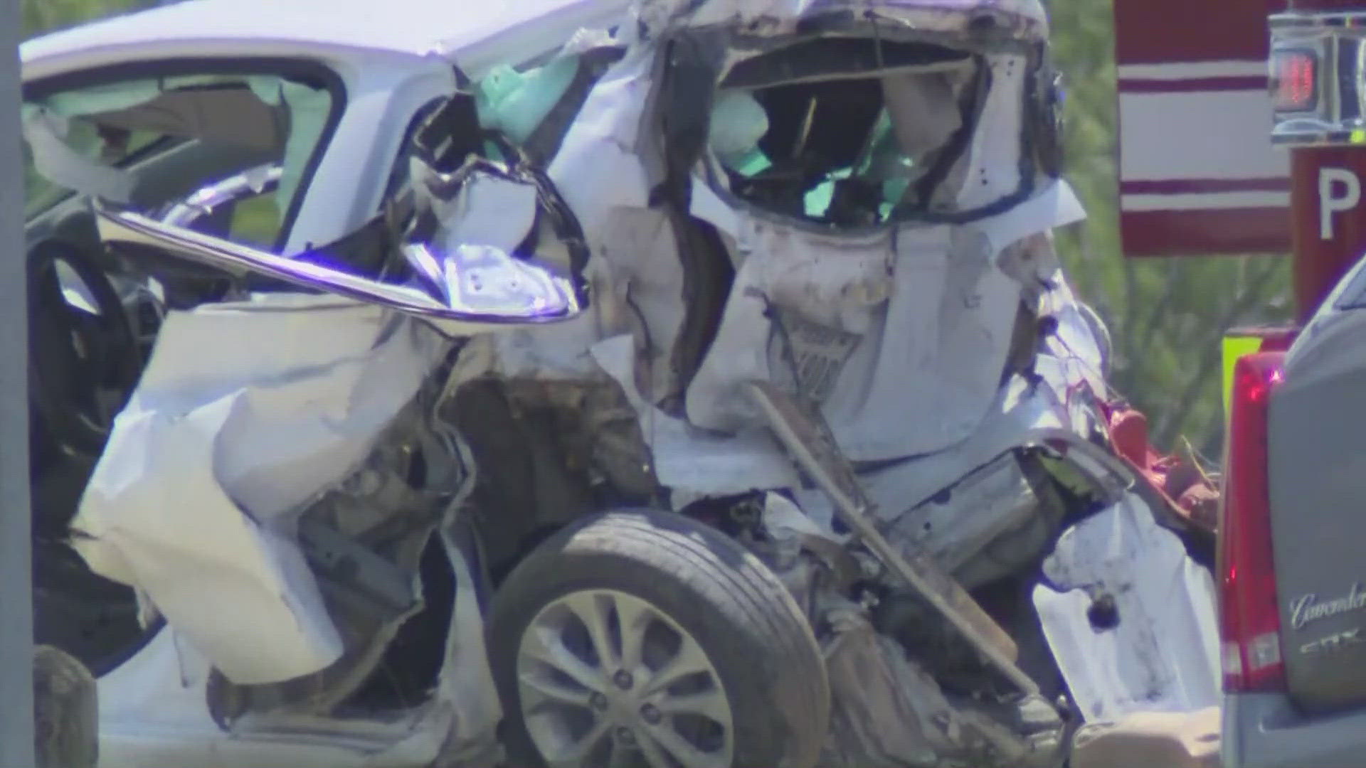 In a construction zone, a vehicle with two people inside was hit from behind by a truck. Both occupants were pronounced dead at the scene, police say.