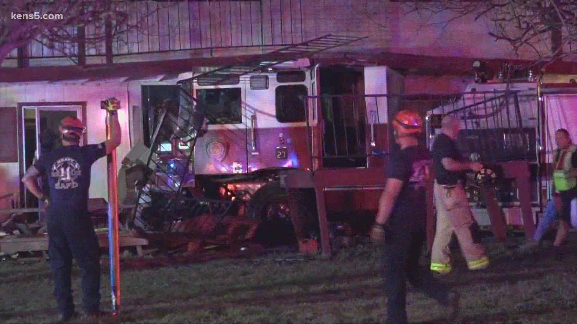 A speeding car hit a San Antonio fire truck, causing it to crash into an apartment building on Tuesday night.