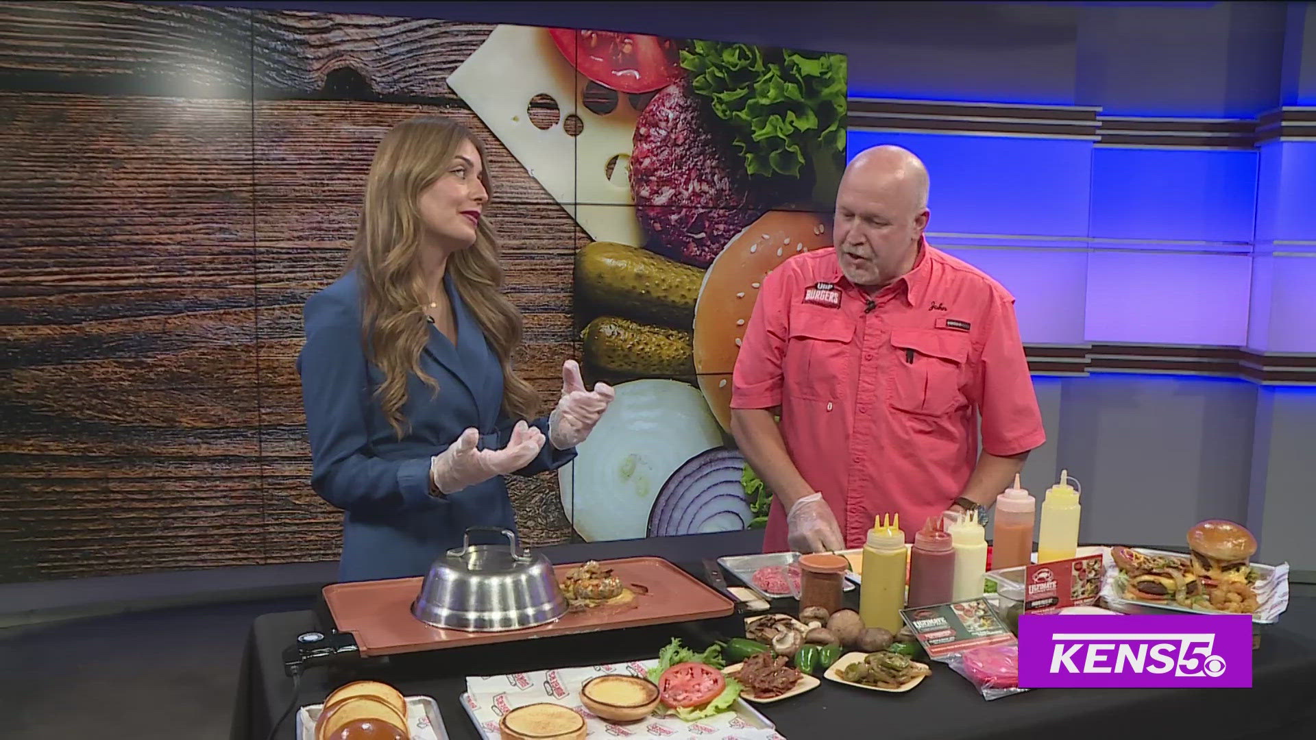 Roma helps make a delicious burger with John Evans of UBP Burgers & Catering.