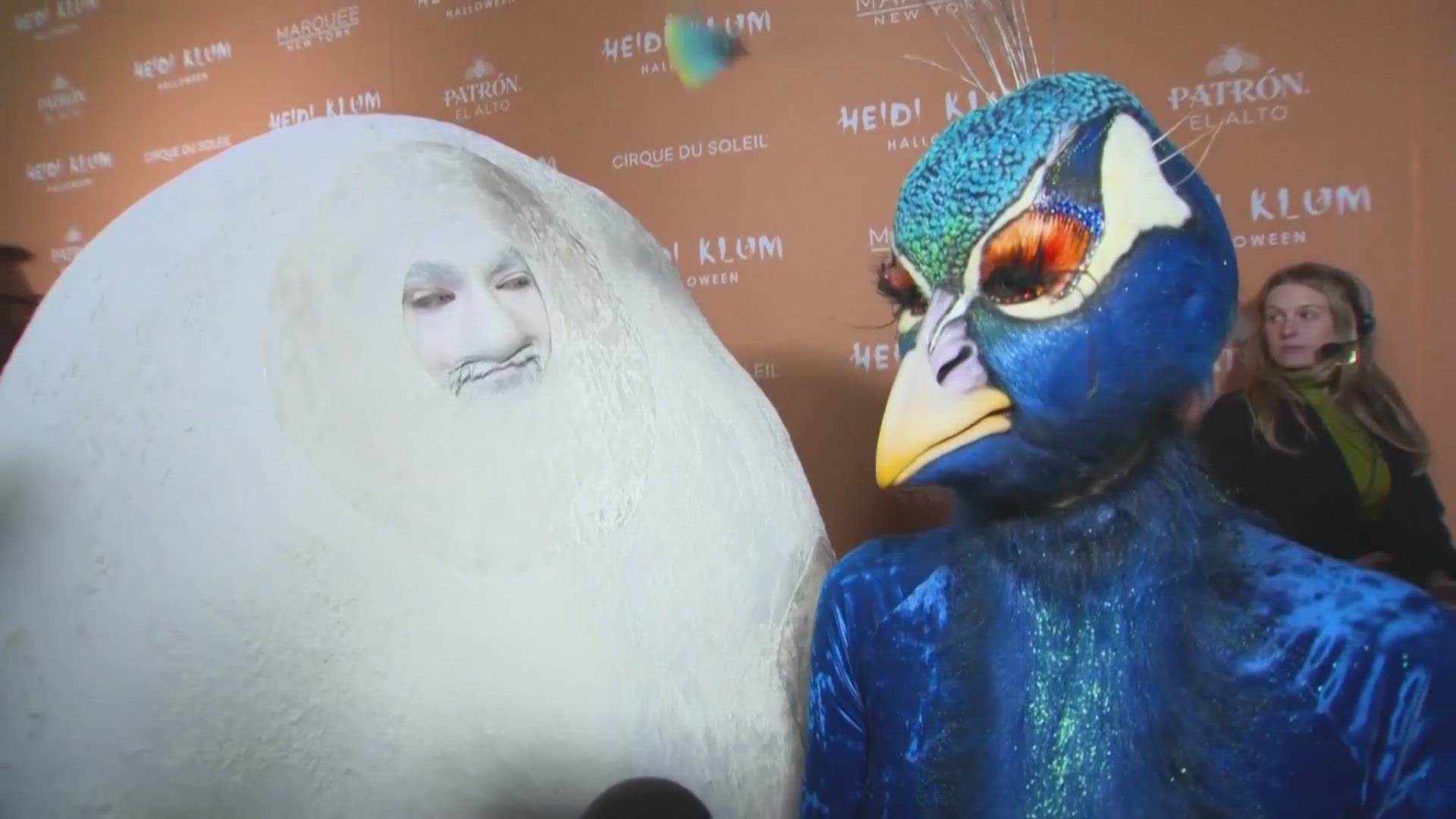 Klum's hubby dressed as a giant egg to accompany his peacock wife.
