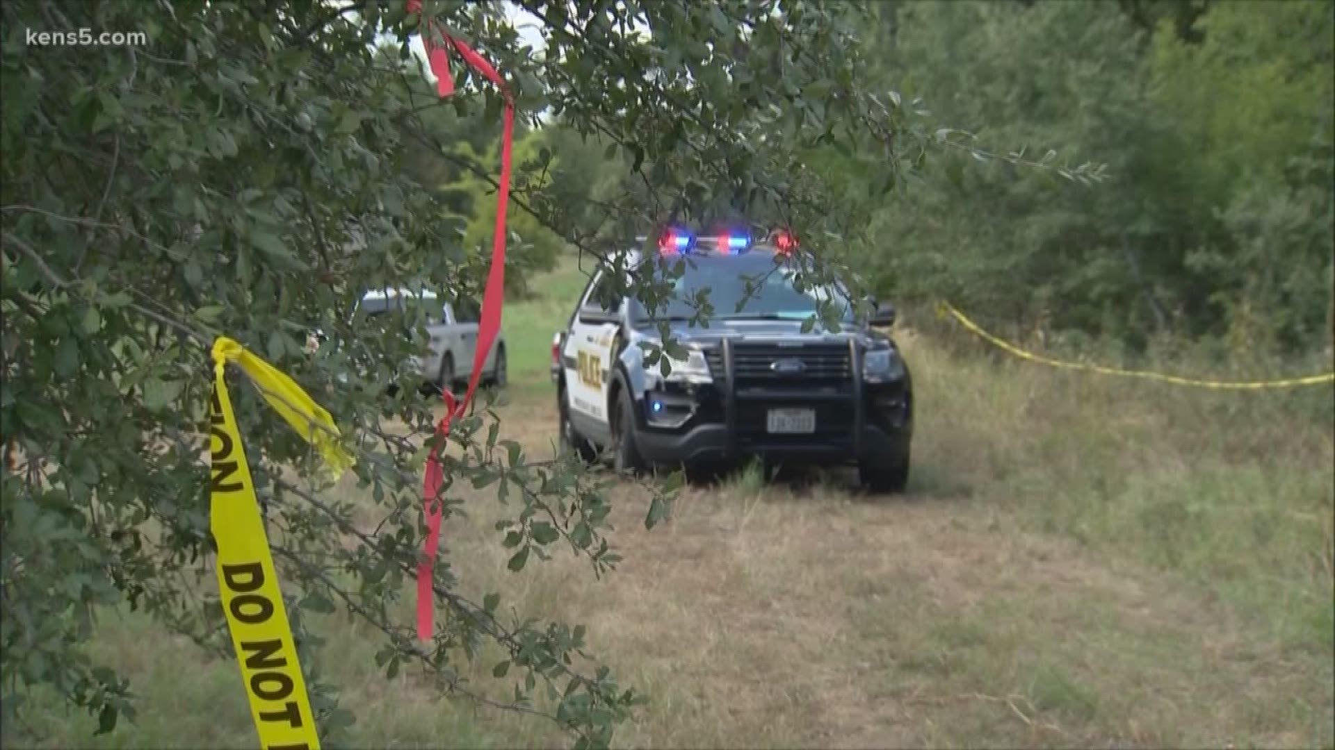 According to police, the remains were found by surveyors walking through the woods near 1604 and Babcock Road.