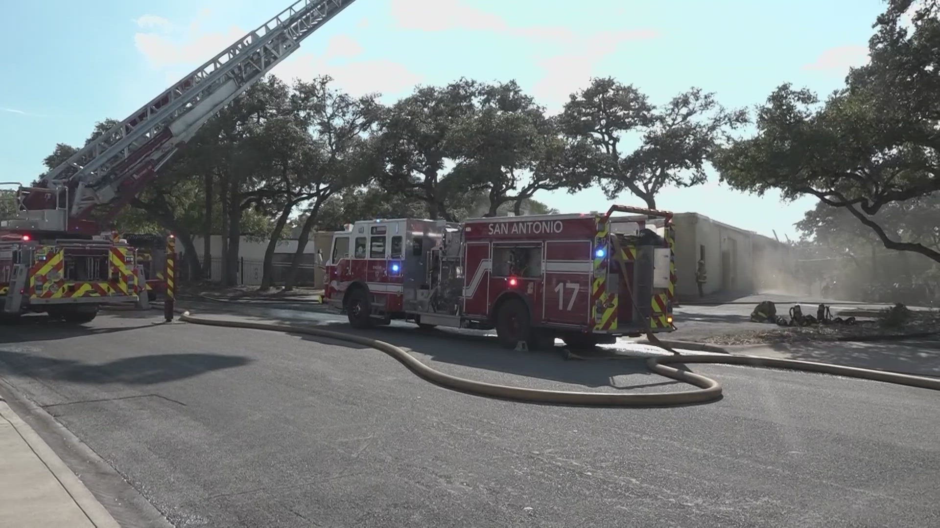 Firefighters from multiple agencies responded to a business and two homes on the same street.