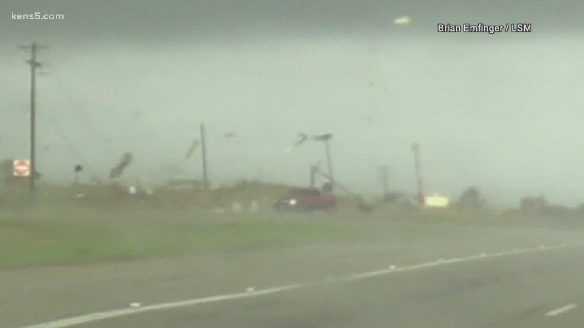 The video was taken in Elgin, about 40 miles east of Austin. The Texas teen's truck was tossed around by a tornado.