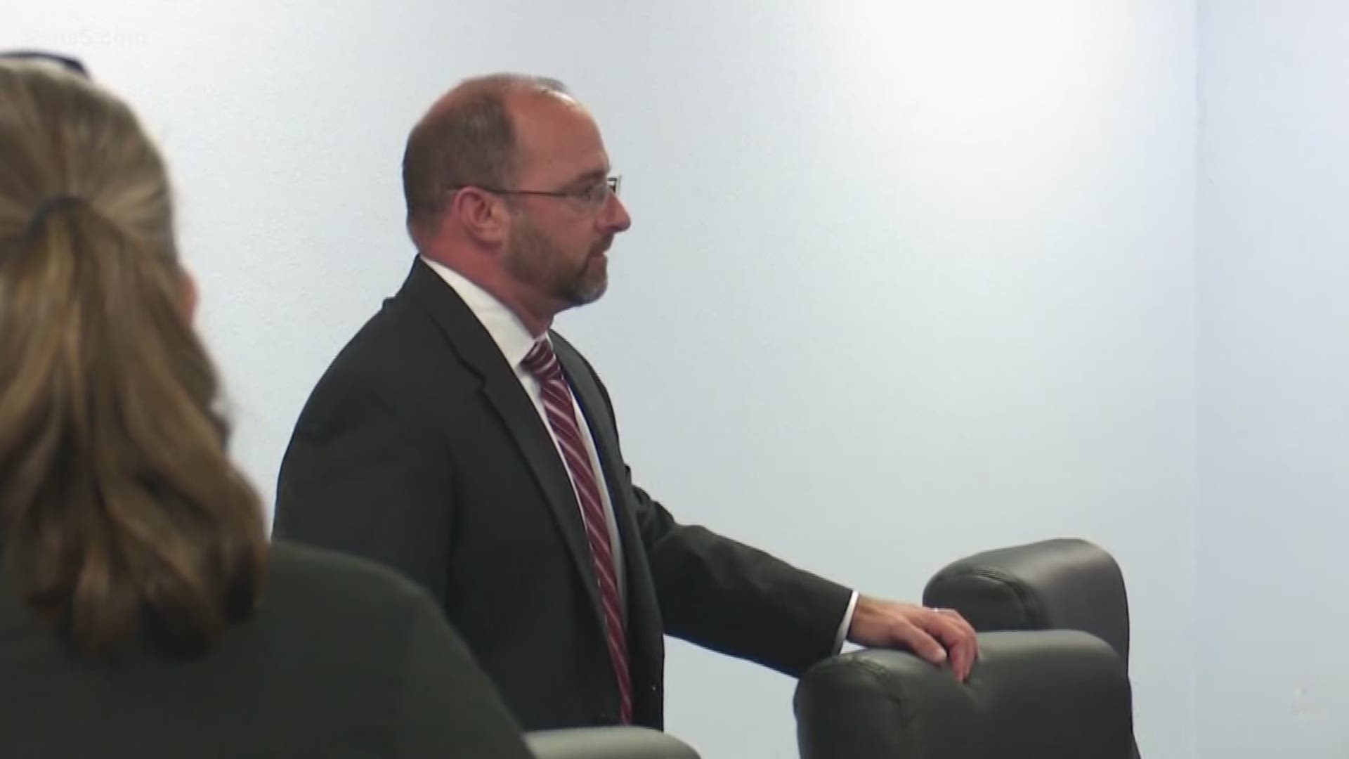 Dr. Trent Lovette is accused of inappropriately touching a student at a football game.