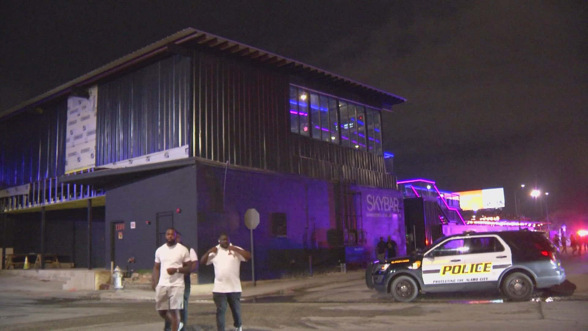 The 29-year-old woman was sitting outside at Skybar when she was hit by a bullet in her upper back.