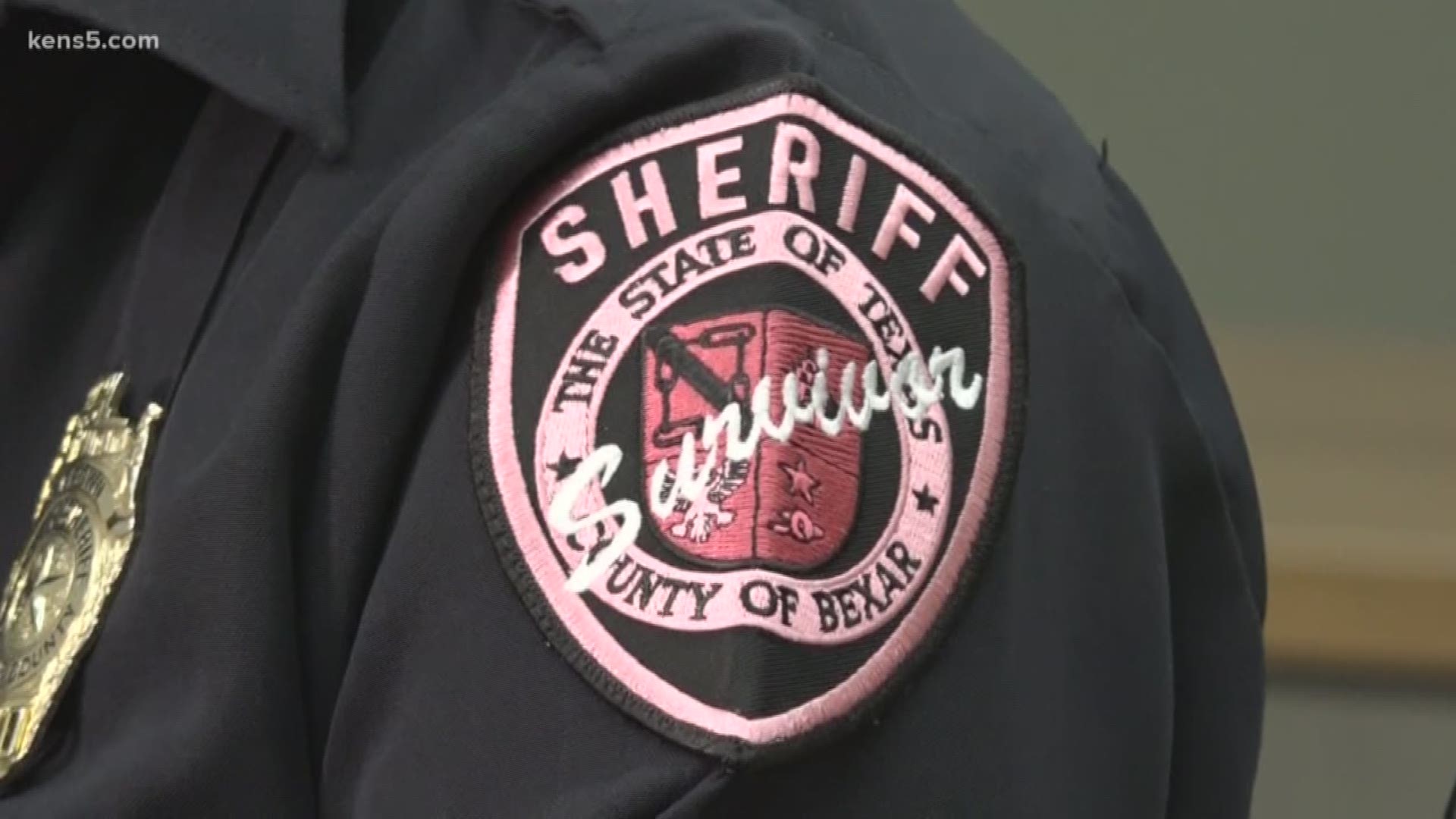 San Antonio police officers and Bexar County sheriff’s deputies are wearing pink badges for cancer awareness in October.