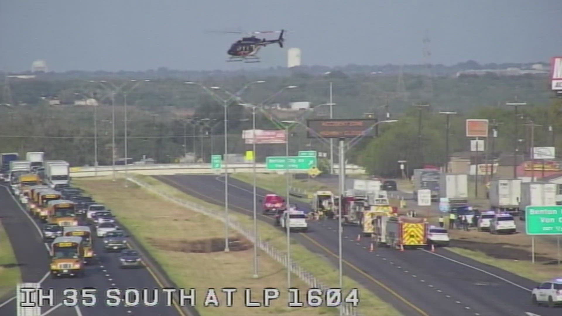 Driver cut out of car stuck under 18-wheeler in San Antonio | kens5.com