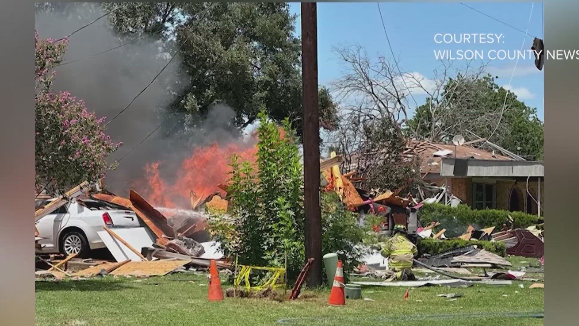 The daytime blast destroyed one home and damaged next-door properties on both sides.