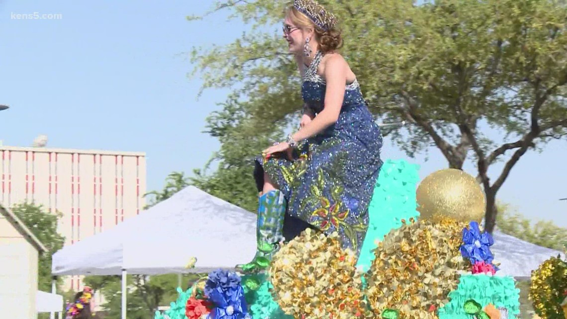Crowds enjoy the colorful floats at Battle of Flowers parade Friday