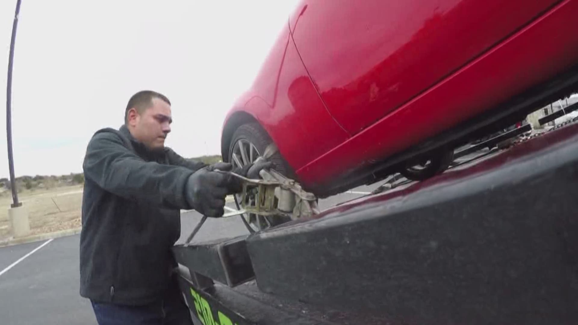 Black ice and dangerous road conditions triggered more than a hundred car accidents and highway closures Tuesday. While many stayed home, tow truck drivers braved the roads to get drivers to safety.