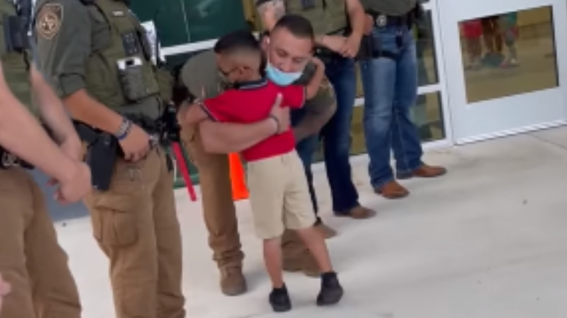 A tender moment caught on camera, shows "Jr. Deputy Joziah Longoria" shaking hands and hugging his late father's fellow deputies on his first day of school.