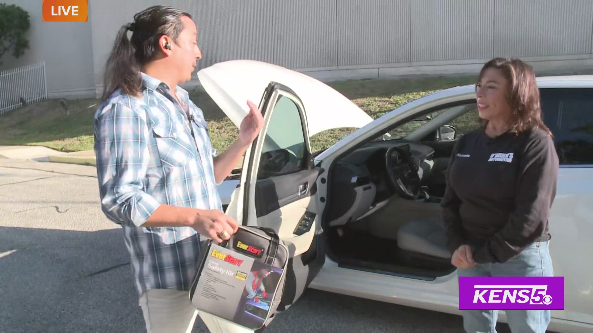 Multi-Skilled Journalist Justin Calderon gets car maintenance tips with Nannette Neugart of O'Brien's Automotive.