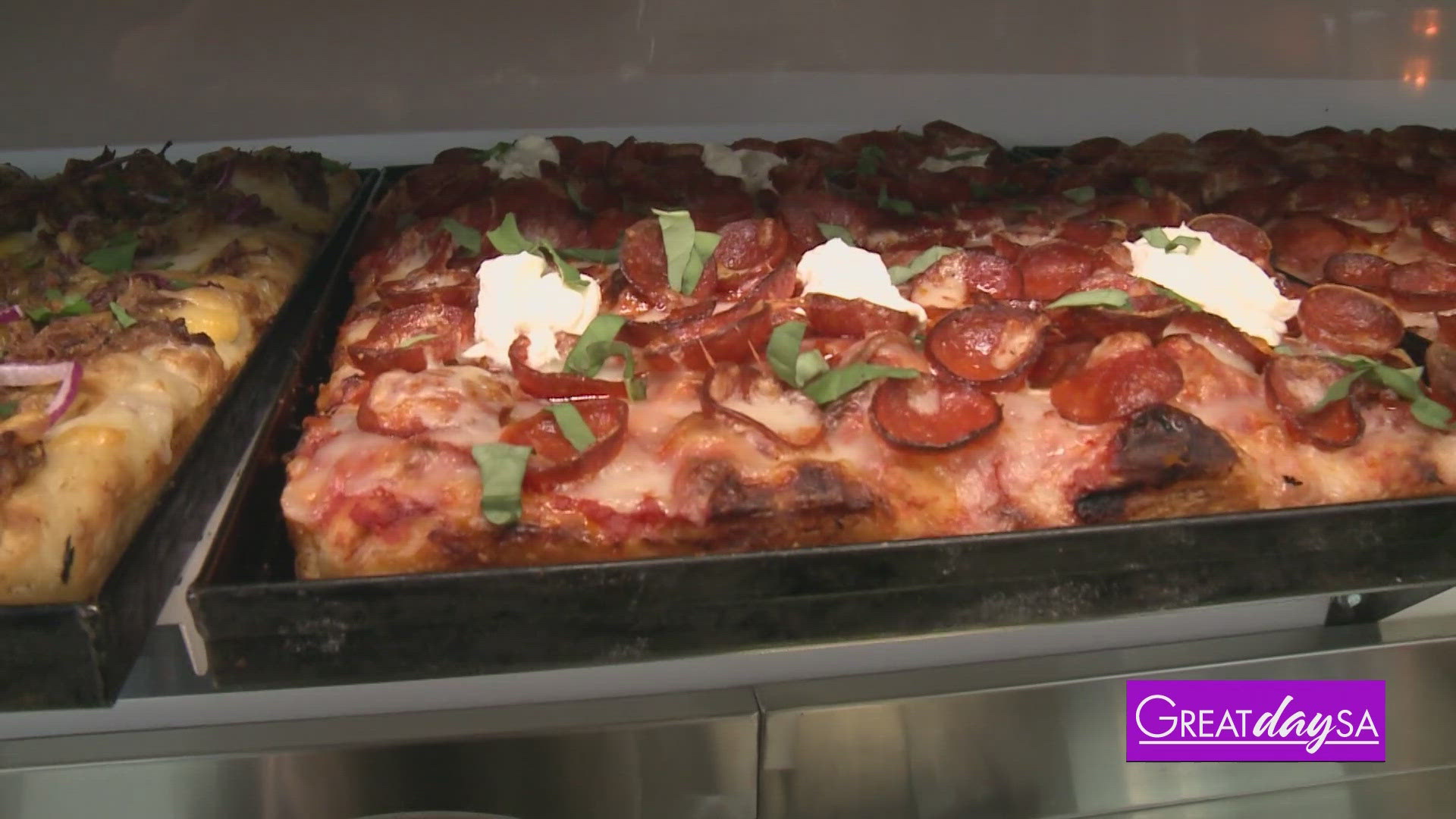 Multi-Skilled Journalist Justin Calderon helps make some Roman-style Pizza.