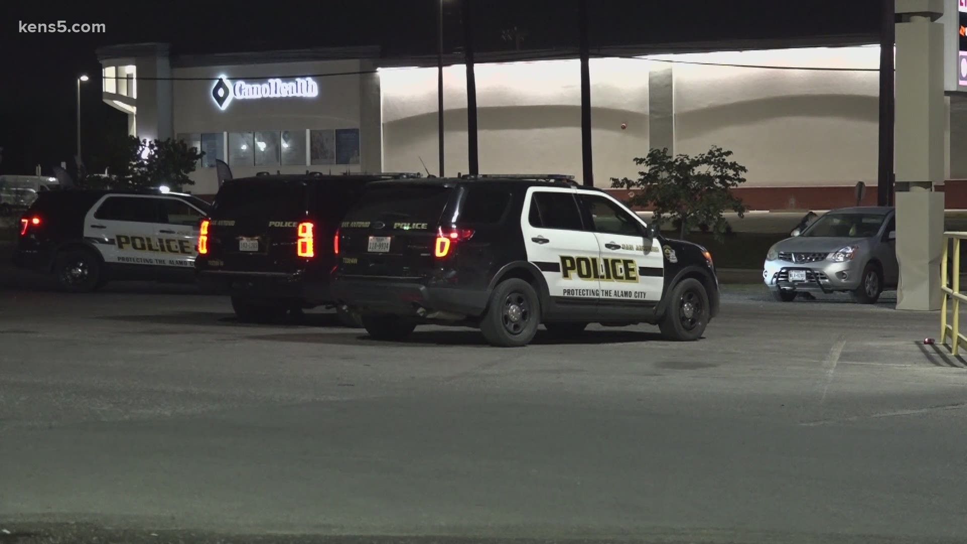 A body was found in a parked SUV at the Marbach Plaza shopping center.
