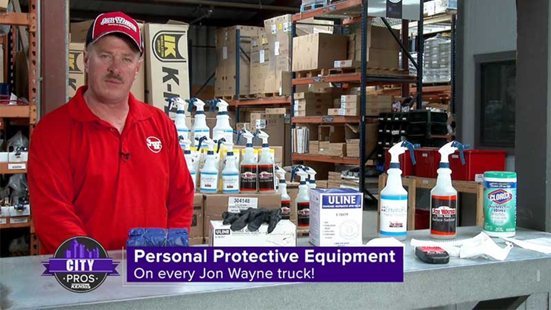 Jon Wayne team members wear shoe covers and black nitrile gloves to avoid bringing contaminants into your home.