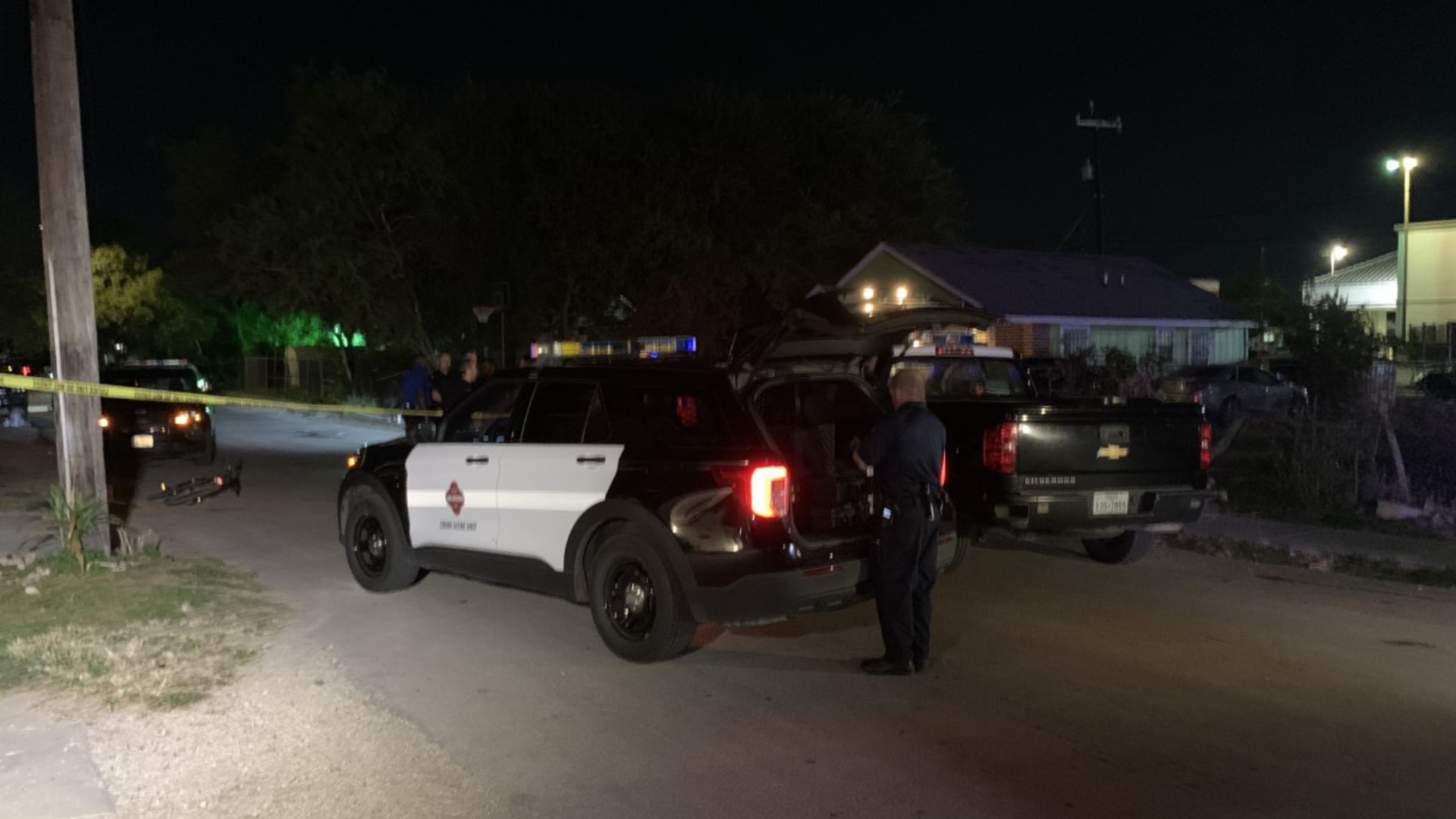 An unknown vehicle heading west on Laurel Street near Zarzamora Road opened fire on the three victims before backing out and fleeing, police said.