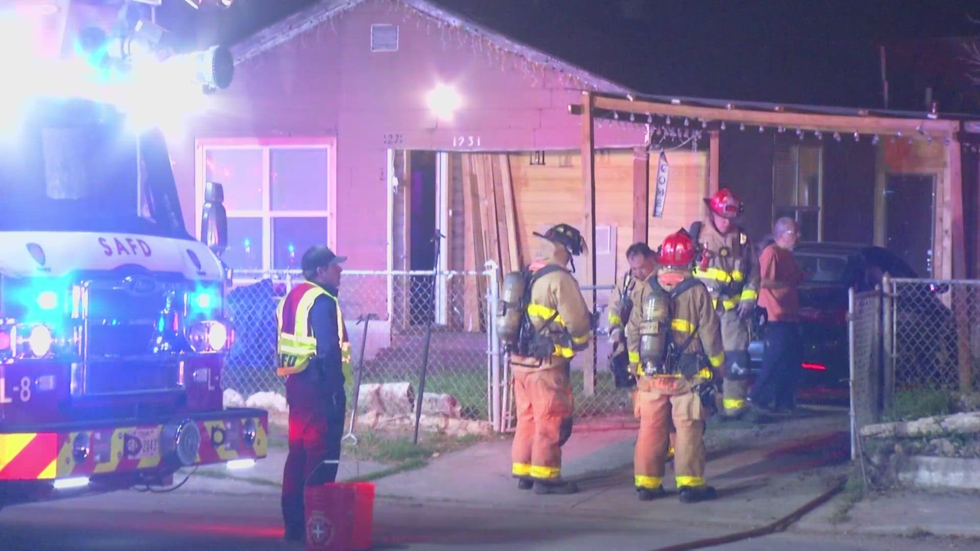 The house and a possible garage apartment both caught fire.