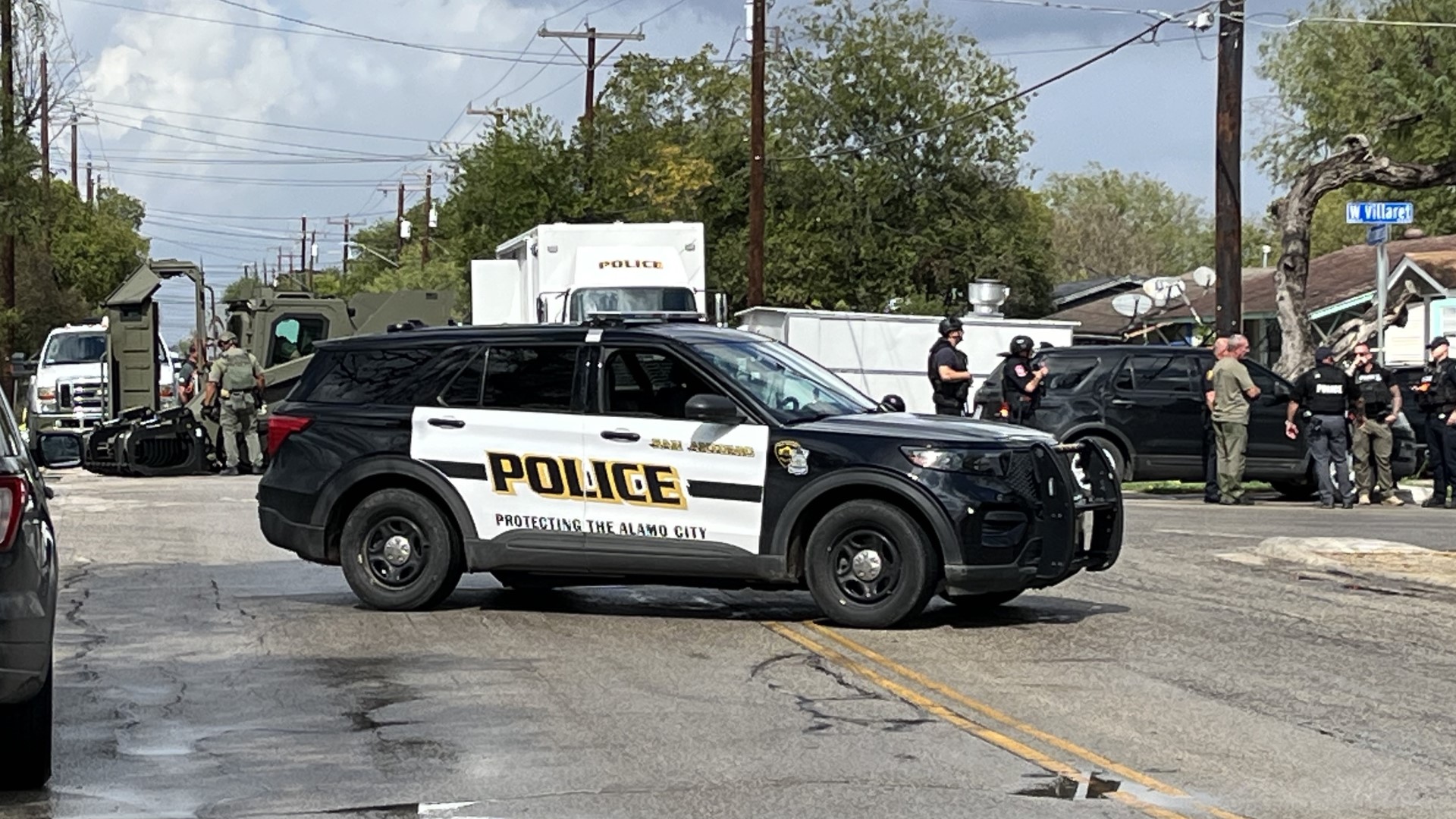 Neighbors in San Antonio initially called police saying the man was roaming through their yard with a rifle and handgun.