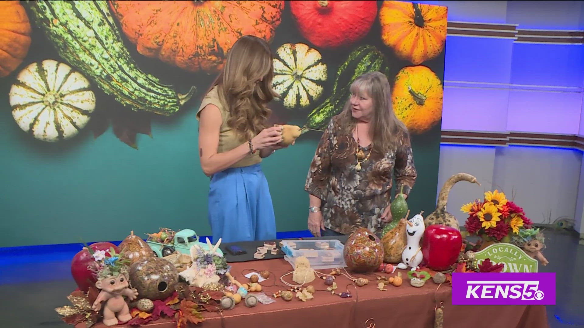 Roma helps make fall craft decor grown by Tanneberger Landscape & Home Improvements. 