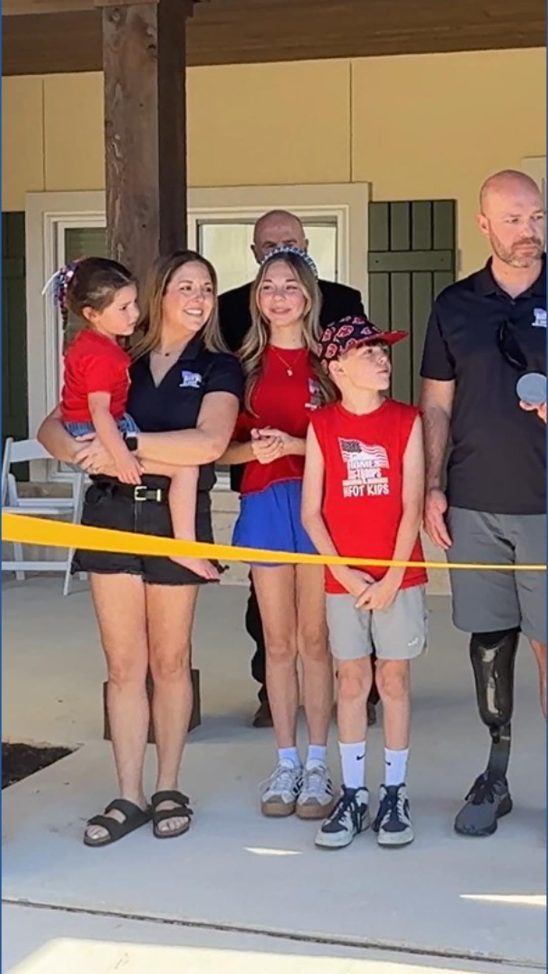 Spring For Key Back Injured U.S. Marine veteran presented keys to new, mortgage-free home ...