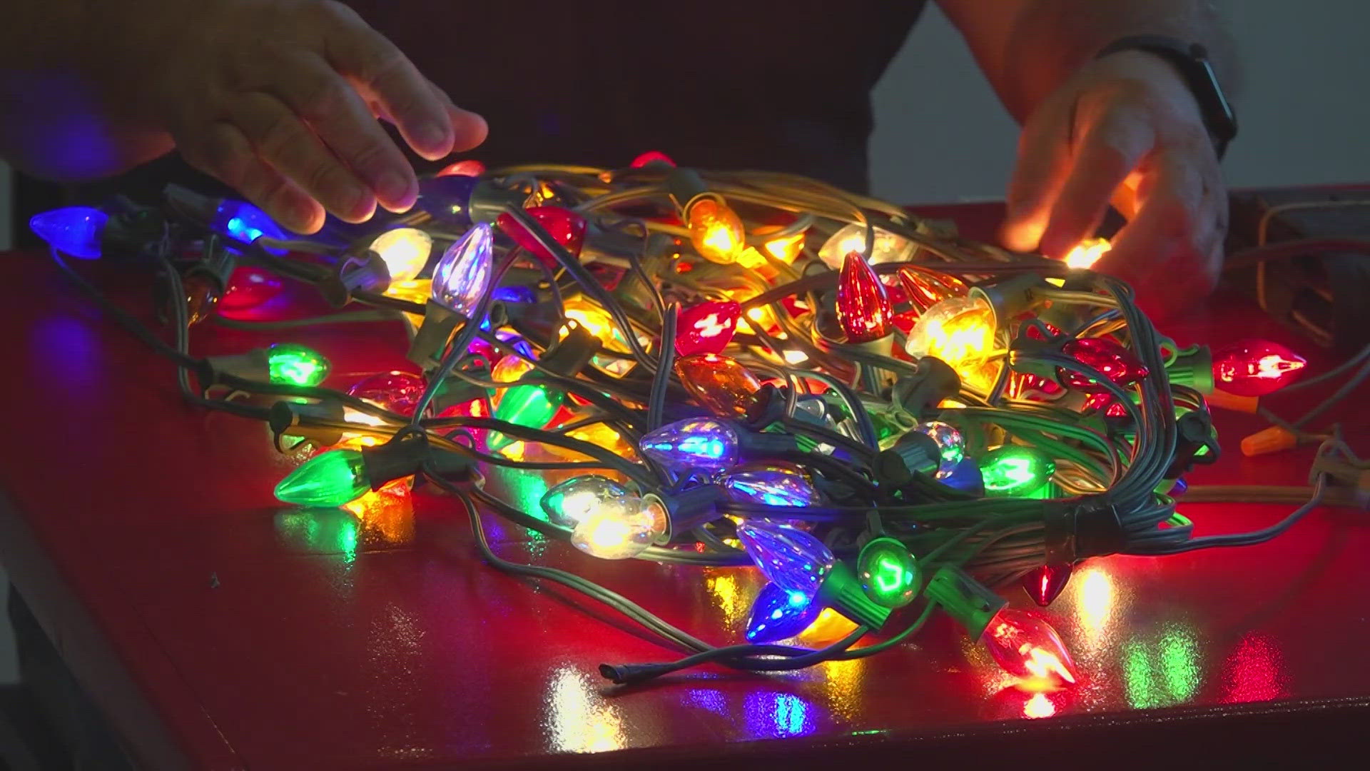 Several students and staff members were getting Christmas lights ready for the Light the Way event.