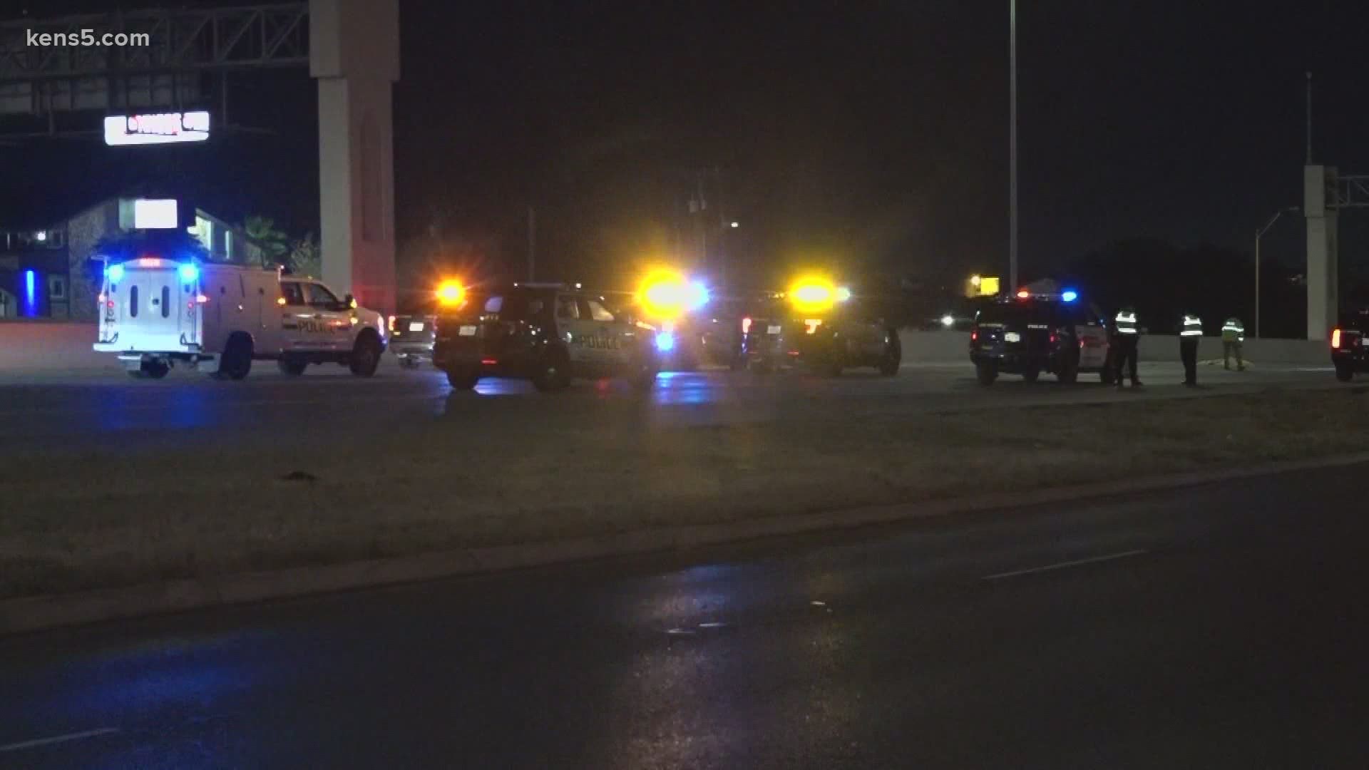 A man running across the freeway was hit by a vehicle on the city's northwest side, the San Antonio Police Department said.