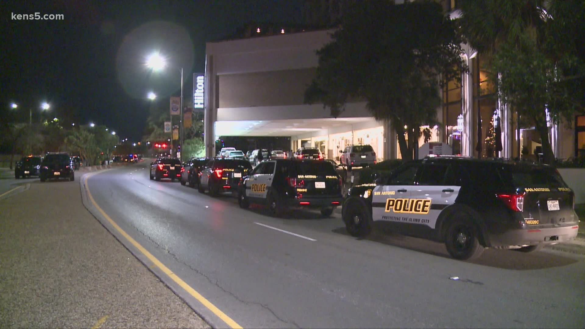 A man was detained by police, accused of firing gunshots on a floor of a downtown hotel, the San Antonio Police Department said.