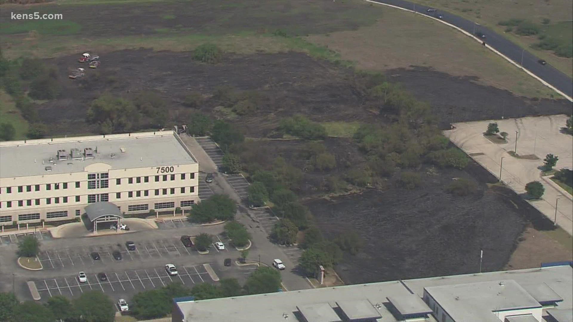 A fire started across the street from South San H.S. around 2:30 p.m.