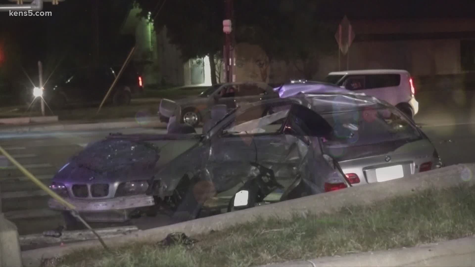 A San Antonio man is thrown from his car in a crash that also ripped the vehicle in two.