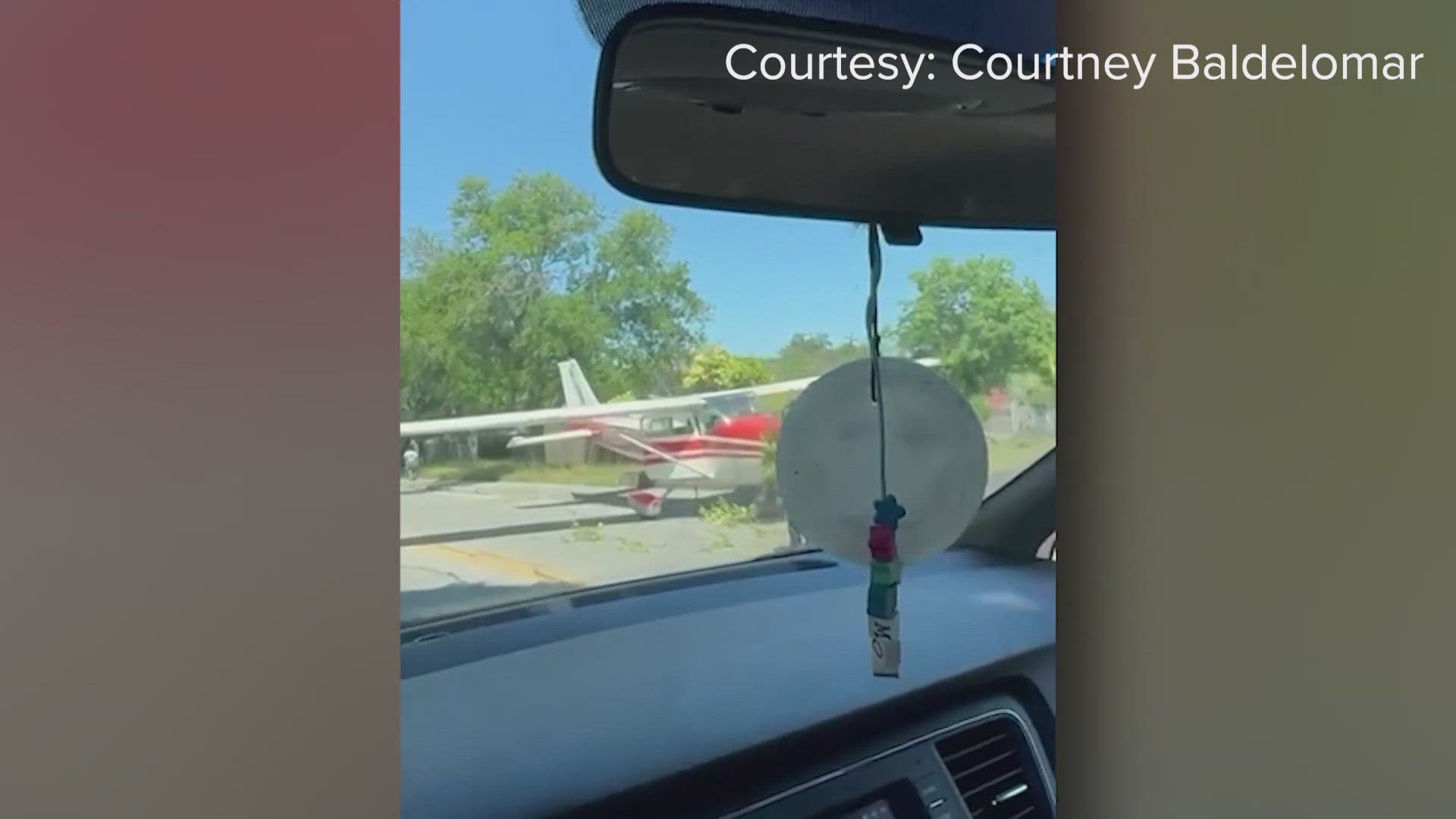 The pilot lost control while landing at Twin Oaks Airport and ended up crashing into the fence and onto Heimer Road. The pilot and passenger walked away safe.