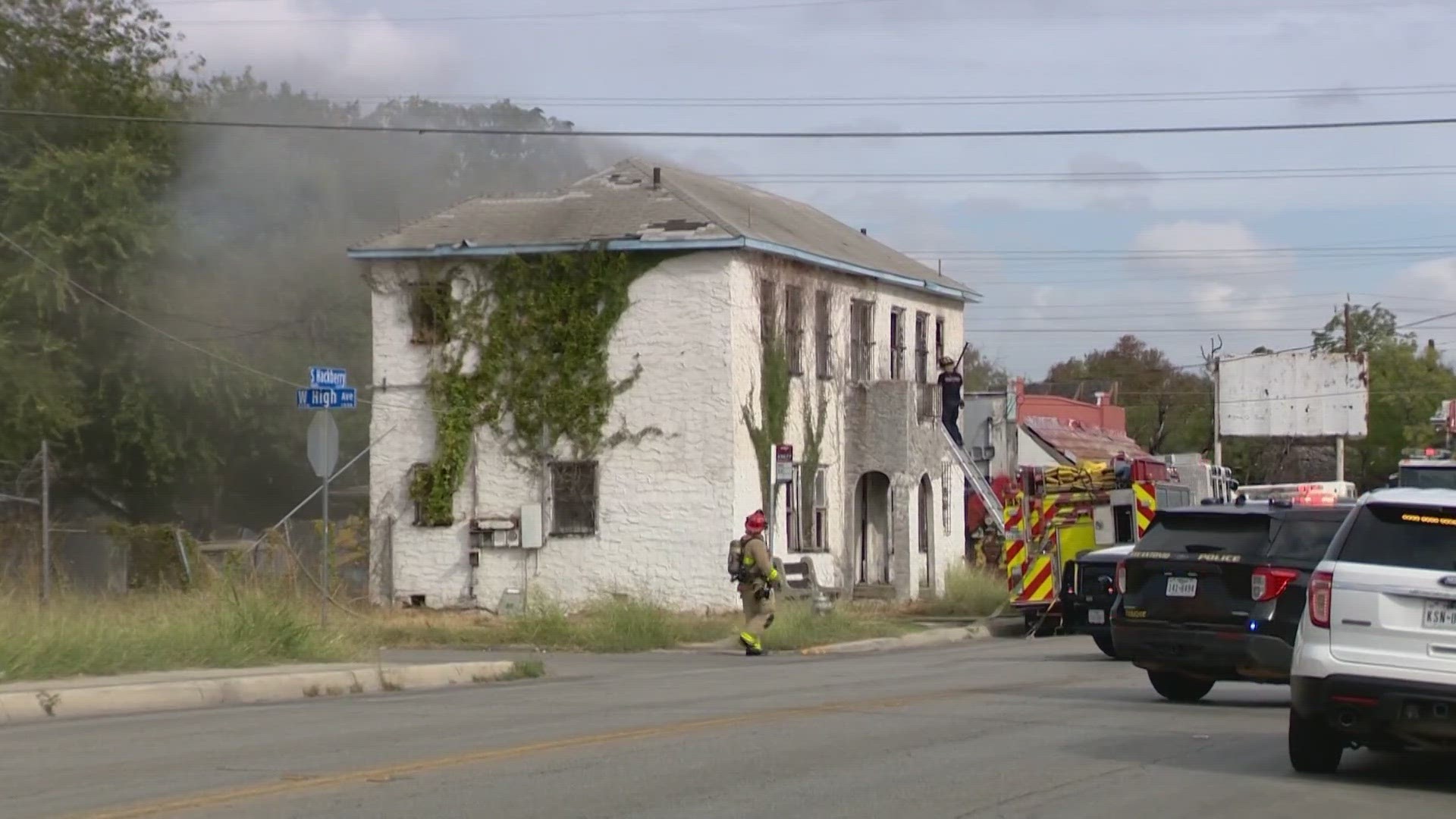 When firefighters arrived, smoke was pouring out of the second story of the building.