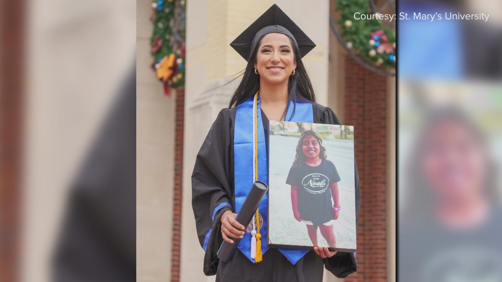 A photo of Lexi Rubio sat in the stands as her mother walked the stage to receive her degree in history.