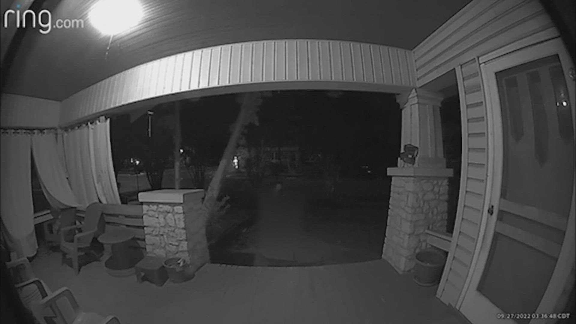 Home surveillance camera captures lewd act on front porch of home.