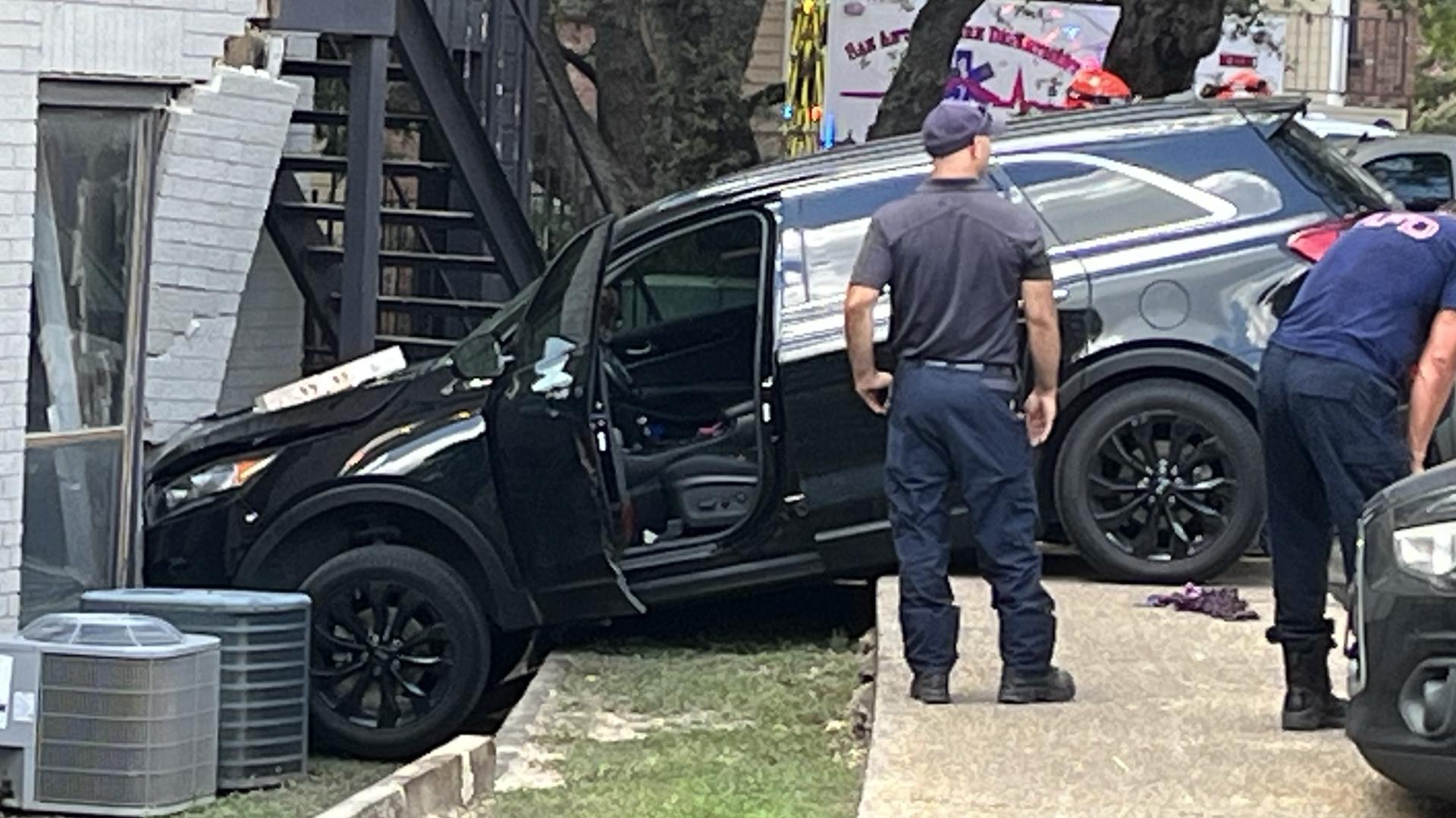 The woman told police she just had gotten back from the gym and was pulling into her parking spot when her leg cramped up and made her accidently press the gas.