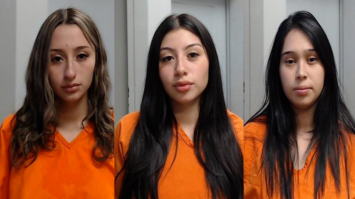 Mugshots of Texas sisters Amaya "Cookie" Diaz and Kitty Mia Diaz with accomplice Kyandra Renee Faz in orange jumpsuits