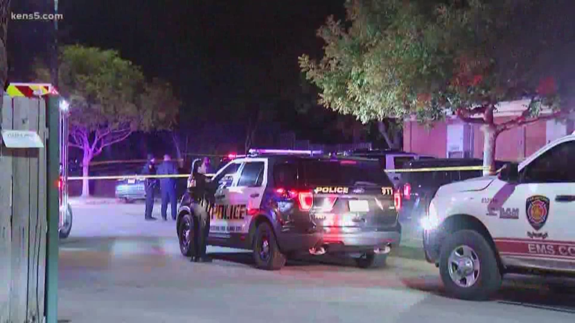Officers found two men dead inside a "shot up" SUV at an east-side apartment complex.