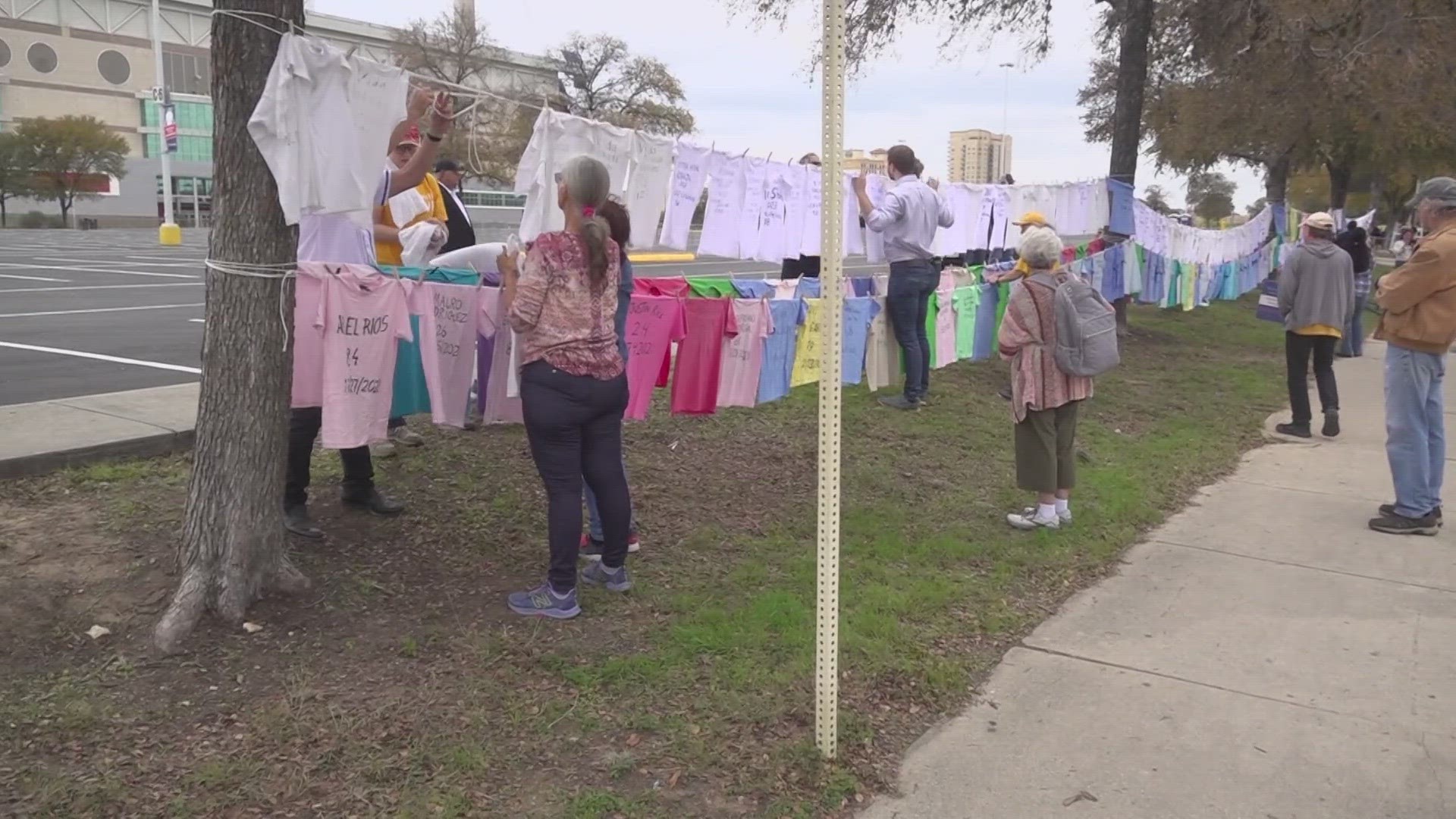 Around 200 shirts line a local street near the Alamodome and each shirt shows the name of a gun violence victim.