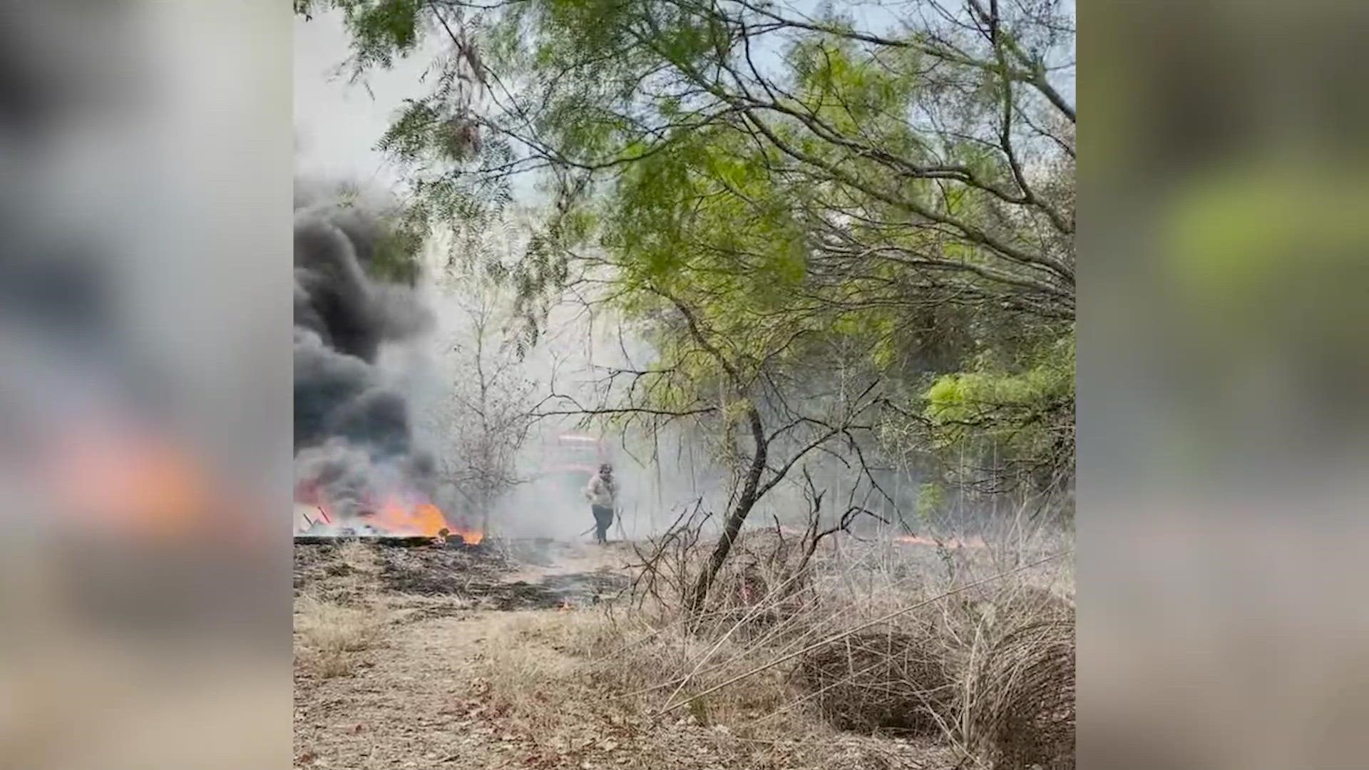 Credit: Adriana Olalde | A large fire is burning in the southeast side of Bexar County Monday afternoon, according to the San Antonio Fire Department.
