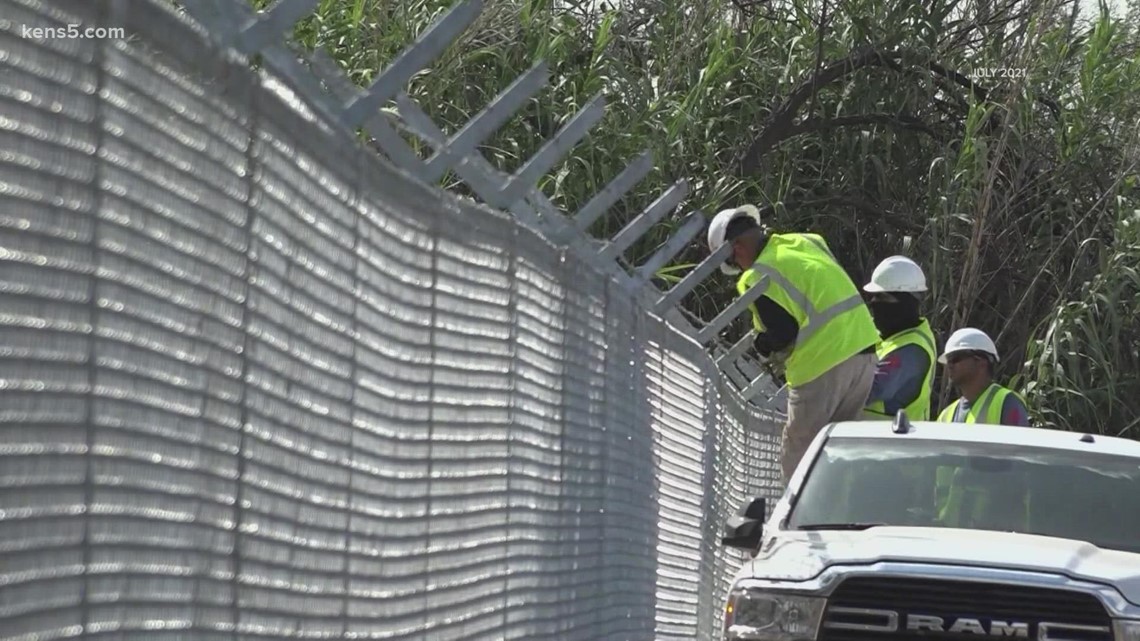 Texas military department builds temporary barrier near border