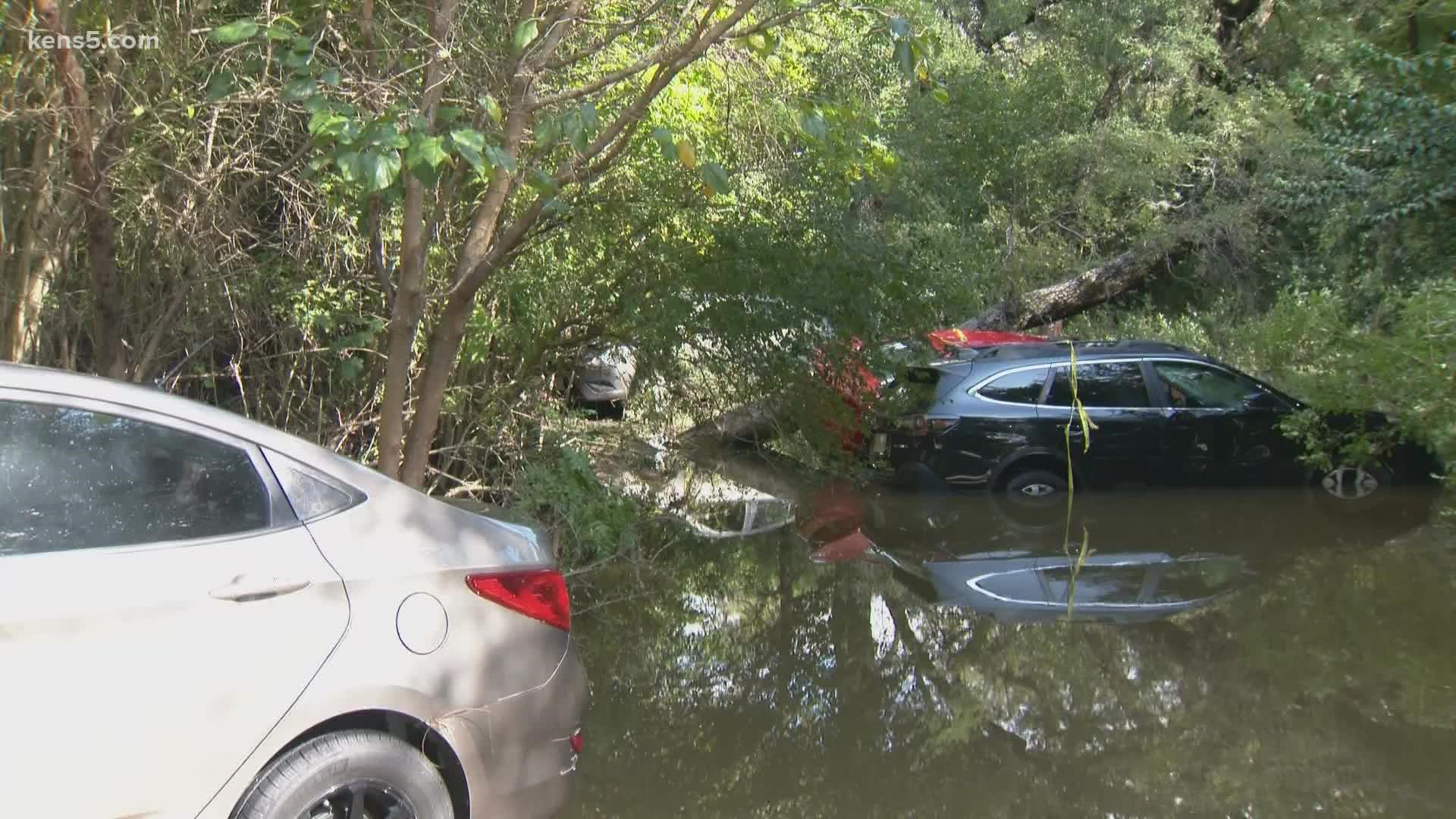 At one point, seven people were stranded on the hoods of their cars before they were rescued by first responders.