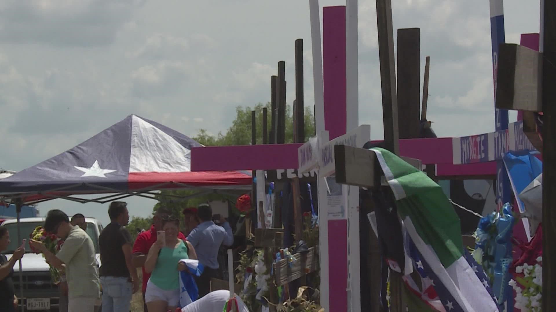 A memorial continues to grow along Quintana Road almost a week after dozens of victims died in a hot tractor trailer.