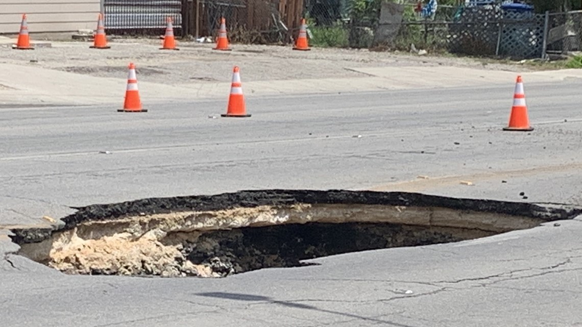 After large sinkhole on west side prompts road closure, pipe now ...