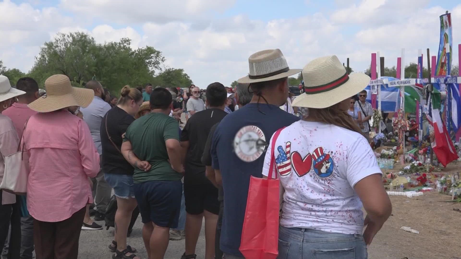 Hundreds of people gathered along Quintana Road to honor and pray for the 53 men, women, and children who died after suffering in an abandoned semi-truck.