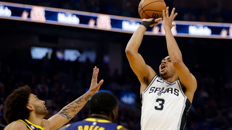Spurs fight, but fall to Warriors 130-115