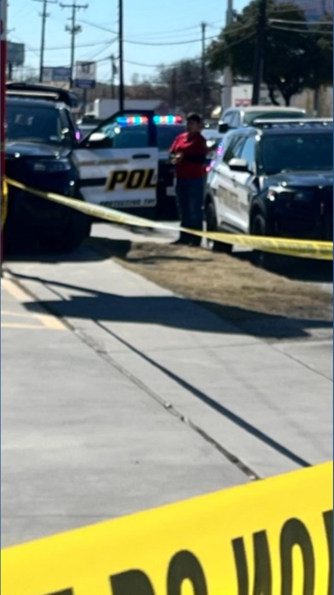 Woman run over by truck in parking lot north of downtown, police say ...