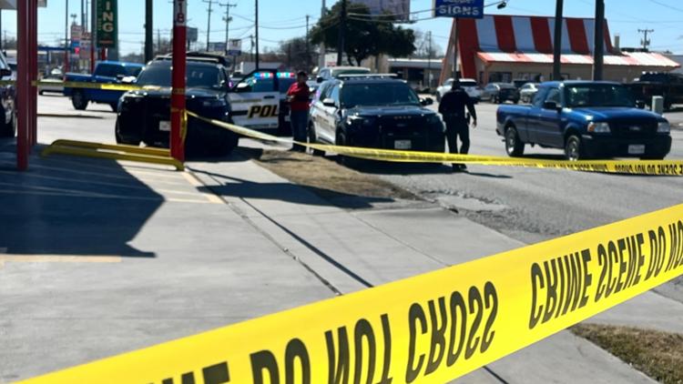 Woman run over by truck in parking lot north of downtown, police say ...