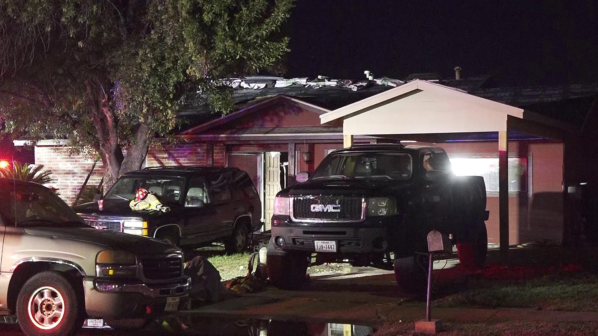 Firefighters arrived to find flames shooting from the roof of the house.